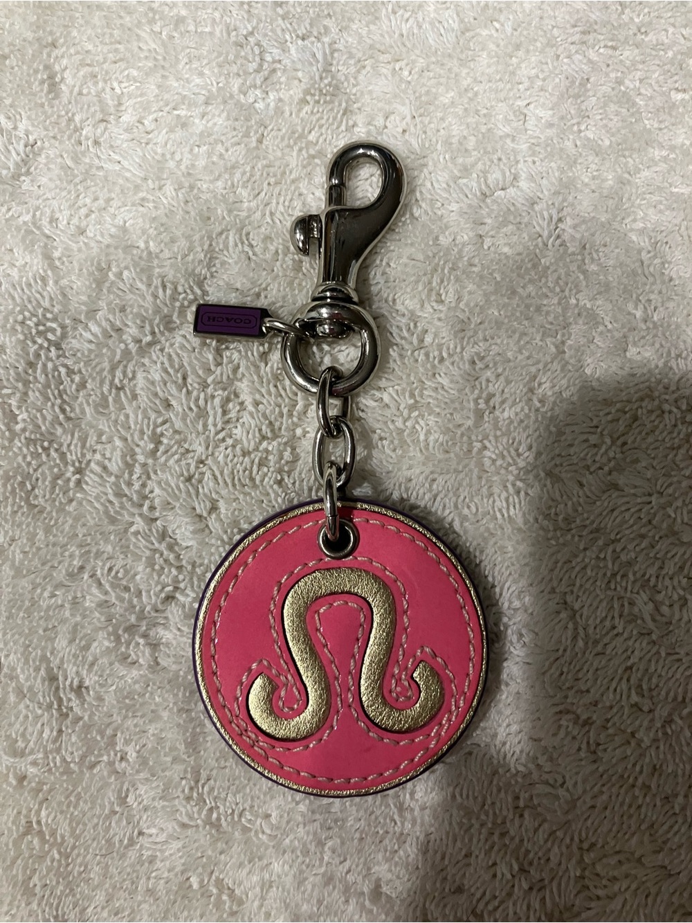 Coach Pink and Gold Round Leo Bag Charm